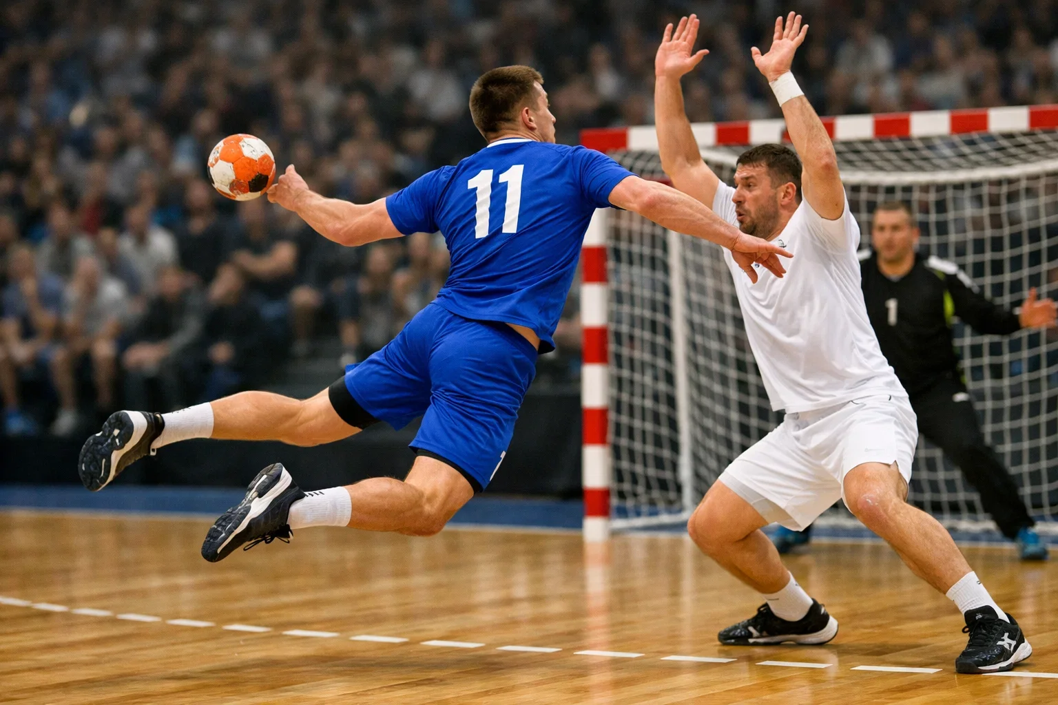 Handballspieler im Zweikampf während eines internationalen Turniers